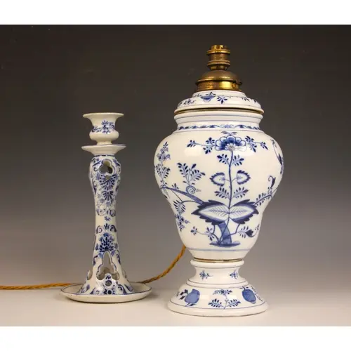 A Meissen blue and white porcelain oil lamp in the onion pat...
