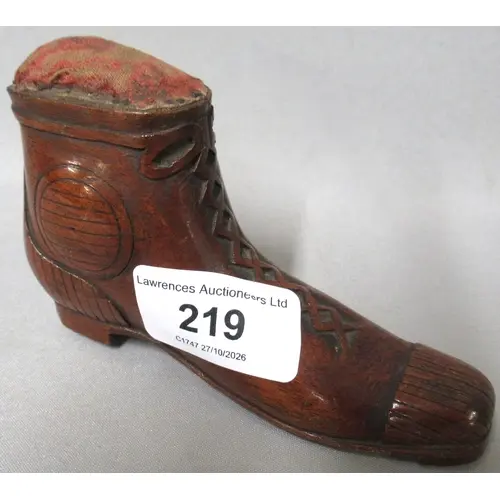 Carved wooden pincushion in the form of a boot, 12cm x 7cm t...