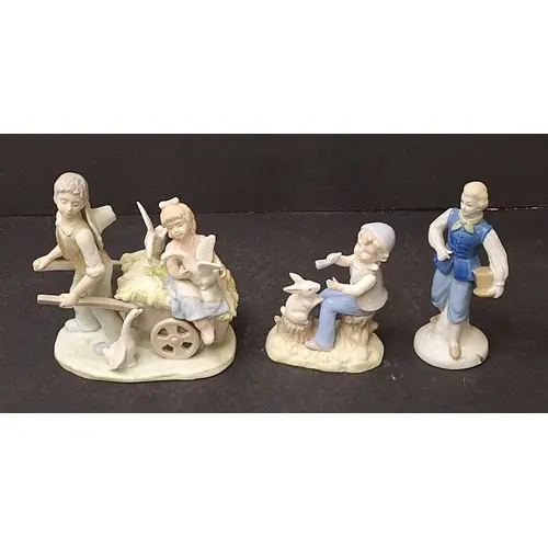 3 Porcelain Figurines, boy holding a top hat indistinctly ma...
