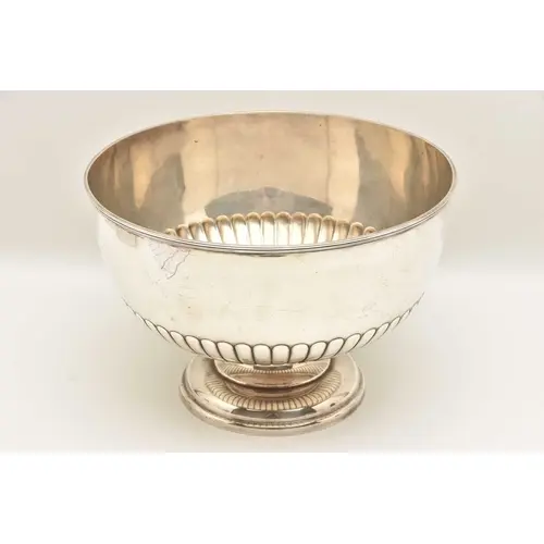 A EDWARD VII SILVER PUNCH BOWL, a large bowl raised on a cir...