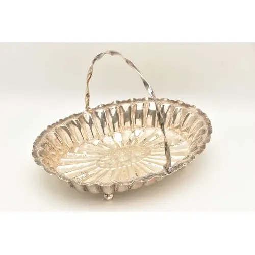A VICTORIAN SILVER BREAD BOWL, a scalloped oval form bowl wi...