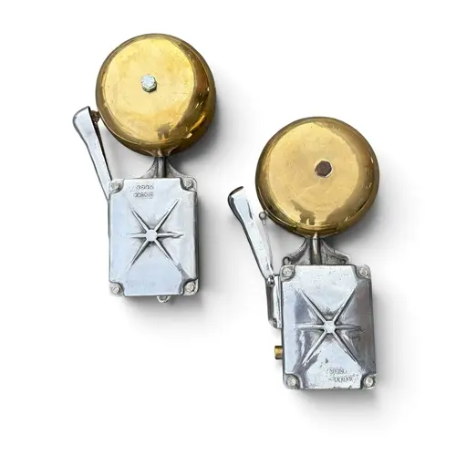 TWO VINTAGE ALUMINIUM AND BRASS ALARM BELLS Stamped 'Madrid'...