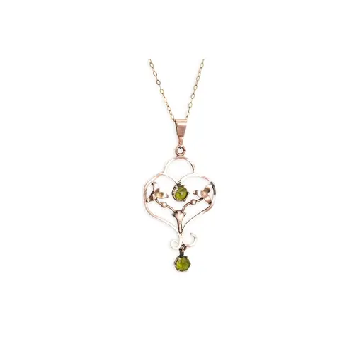 AN ART NOUVEAU PENDANT, stamped 9ct, 1.88g