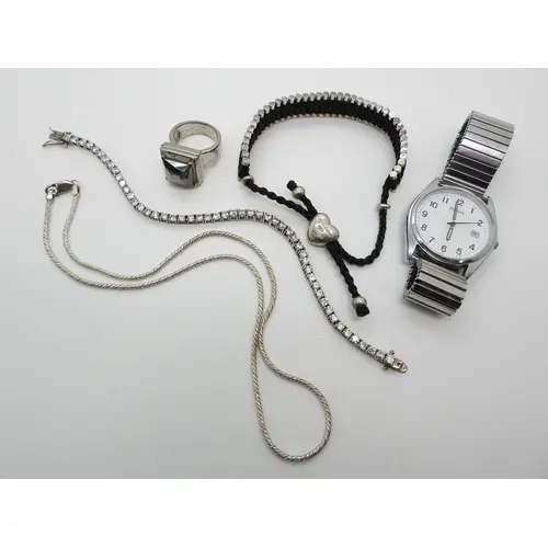 A silver Links Of London cord bracelet (full hallmarks) a si...