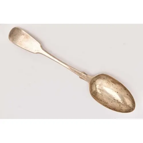 A VICTORIAN SILVER FIDDLE PATTERN TABLE SPOON, polished spoo...