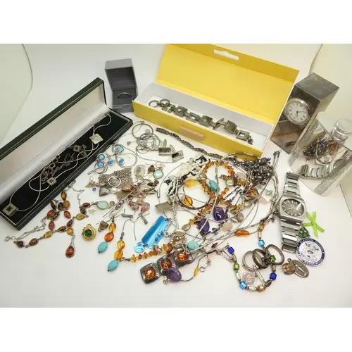 A collection of designer silver jewellery to include items s...