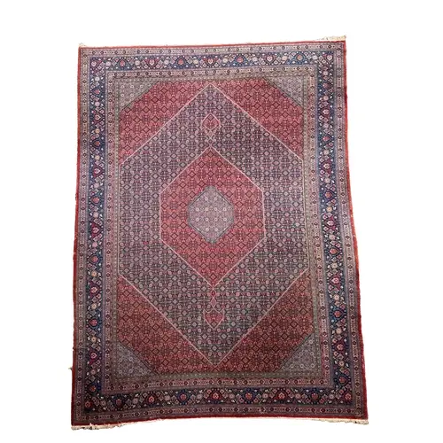 A large Bidjar carpet, early 20th century, woven dense flora...