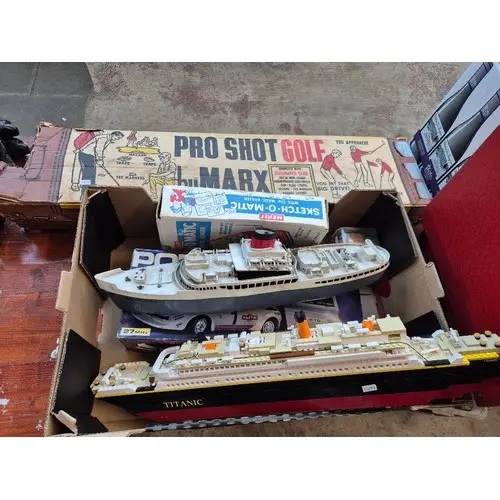 A mixed lot of toys and games including a Lego Titanic, a pl...