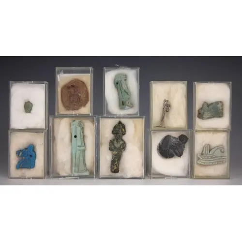 A selection of Egyptian antiquities, to include a votive off...