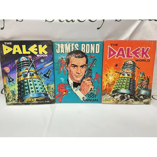 2 Early Doctor Who Dalek Annuals And A James Bond Annual.