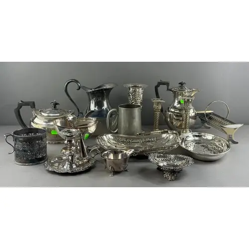 Silver Plate: a pair of spiral candlesticks with square base...