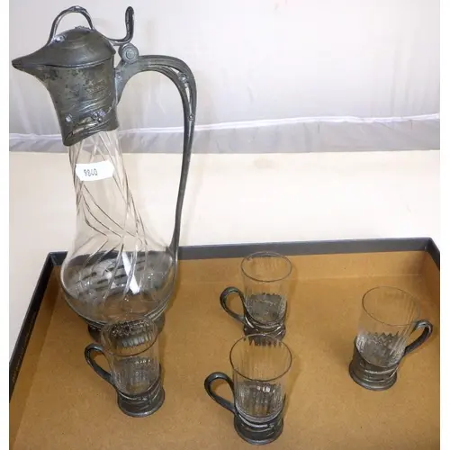 An Art Nouveau liquor jug and four cups with associated glas...