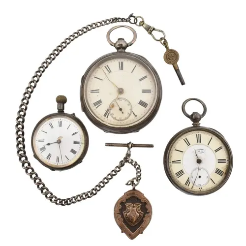 Two silver pocket watches and a metal pocket watch together ...