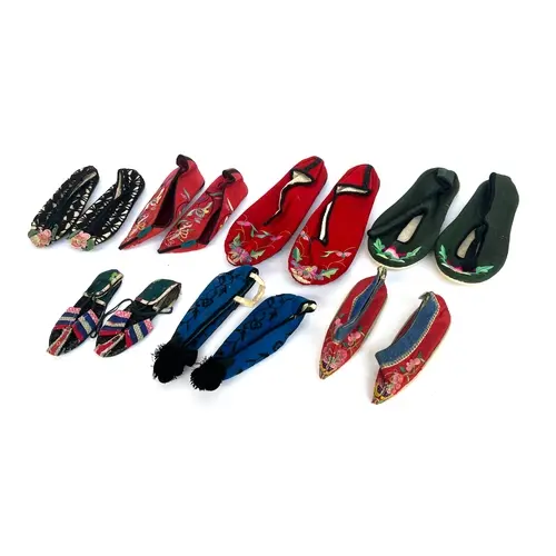 Seven pairs of antique Chinese silk and cotton shoes, to inc...