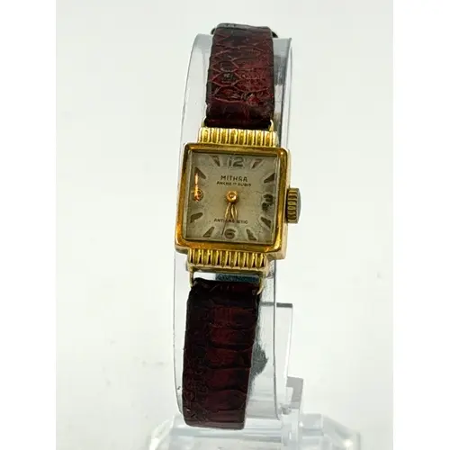 An 18ct gold Mithra Ancre 17 Jewels antimagnetic watch on le...
