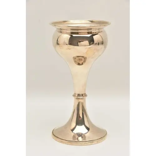 A GEORGE V SILVER BUD VASE, gilt interior with weighted roun...