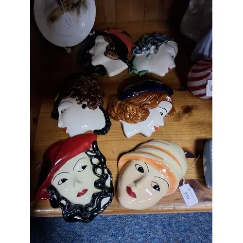 A SMALL GROUP OF SIX ART DECO STYLE WALL MASKS from Moorland...
