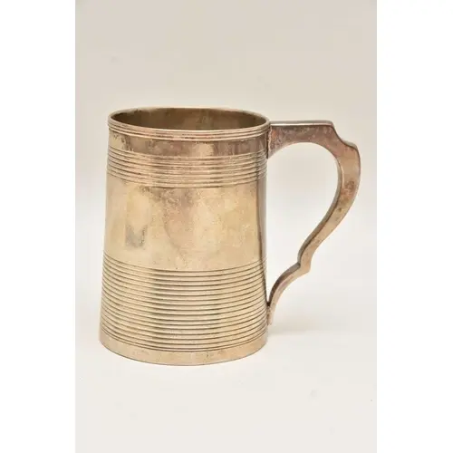 A LATE VICTORIAN SILVER CUP, with engine turned pattern and ...