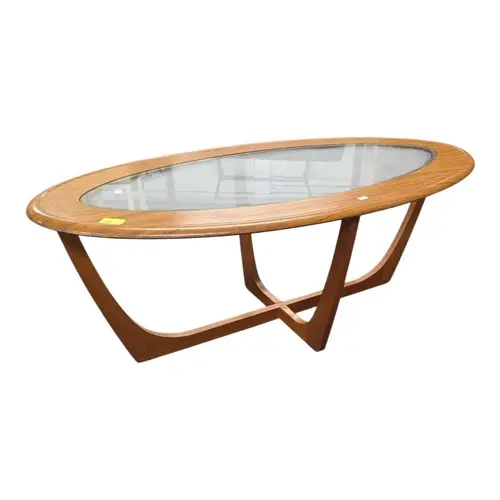 Schreiber Furniture - A vintage 20th century teak oval coffe...