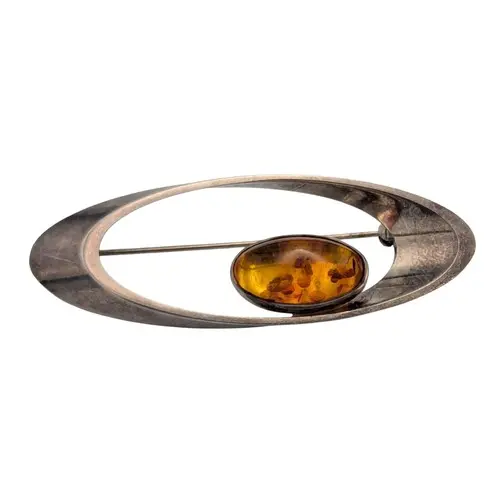 Niels Erik From (1908-1982) a Danish silver and amber colour...