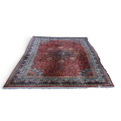 A PERSIAN WOOL CARPET 340cm x 245cm