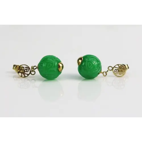 A pair of Chinese carved jade drop earrings in 14K yellow go...
