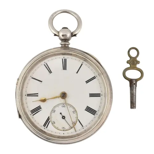 A Victorian hallmarked silver pocket watch. The watch with R...