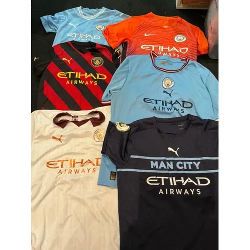 Manchester City Football Shirt Collection: Four adult and tw...