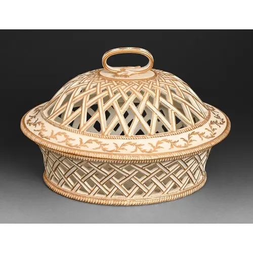 An Etienne Blancheron Paris porcelain pierced basket and cov...