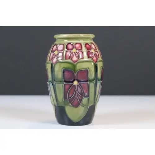 Moorcroft pottery 'Violet' pattern vase, of ovoid form, desi...