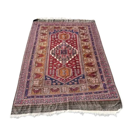 A CAUCASIAN DESIGN RUG 245cm x 156cm