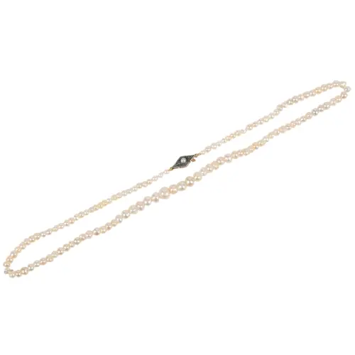 A natural pearl necklace, early 20th century, composed of a ...