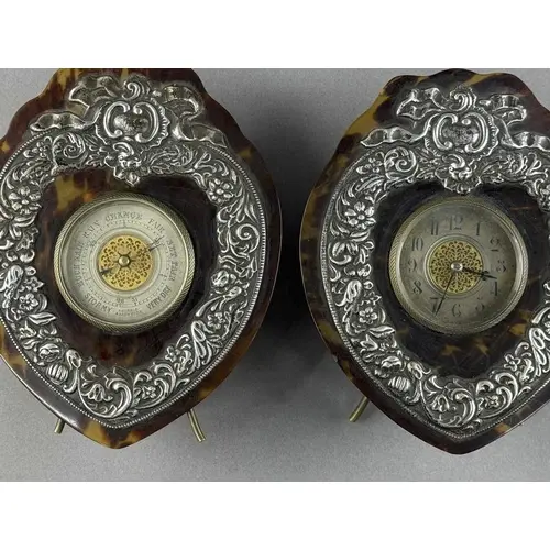 Decorative Arts: a shield shaped tortoiseshell and silver mo...