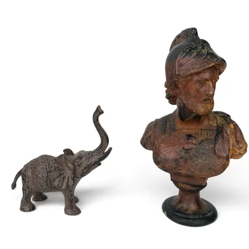 A PAINTED WAX BUST OF MARS TOGETHER WITH A CAST IRON SCULPTU...
