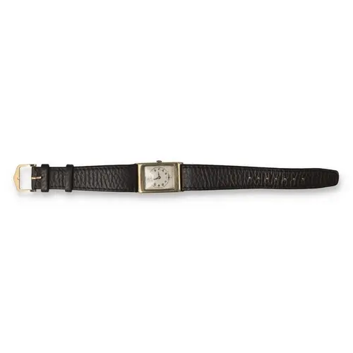 A 9CT GOLD CRUSADER WATCH With leather strap
