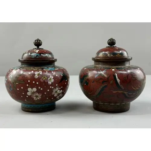 Oriental: a pair of late Meiji Japanese cloisonne lidded jar...