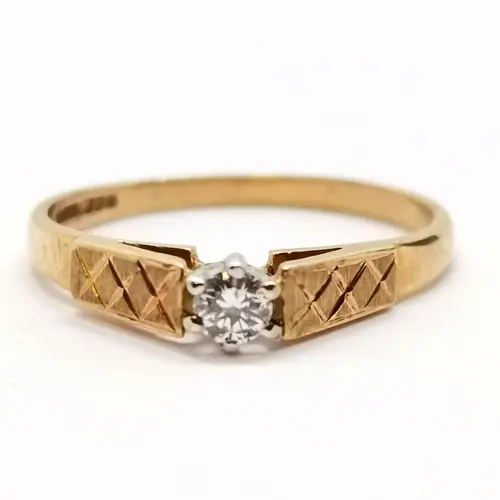9ct hallmarked gold diamond solitare ring with bright cut sh...