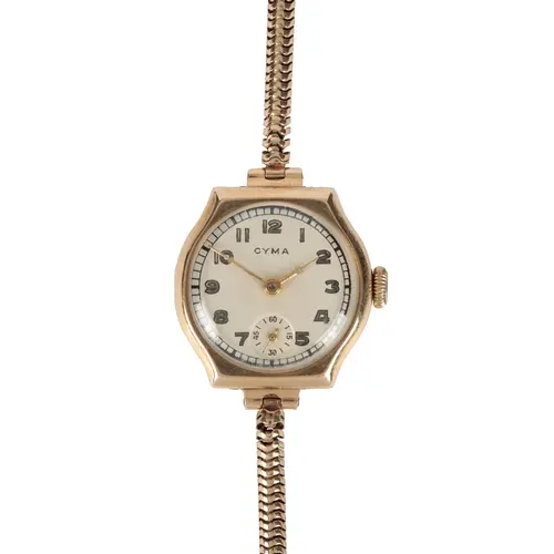 A lady's 1950's 9ct gold Cyma manual wind wrist watch, with ...