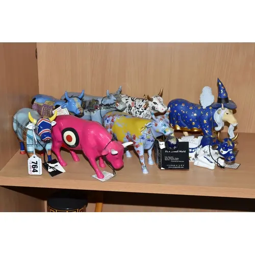 EIGHT COW PARADE SCULPTURES, comprising, no. 6005 Cower Brid...