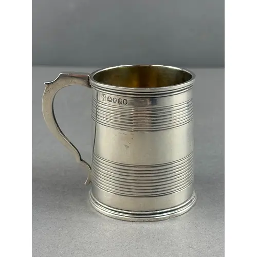 Silver: a tapering christening mug by Joseph & Albert Sa...