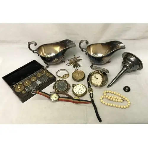 Two base metal cased pocket watches; a Baume et Mercier Gene...