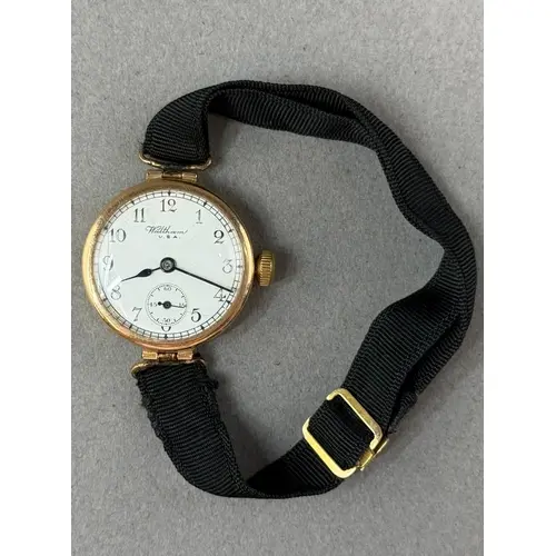 Watches: a 9ct gold cased Waltham wristwatch on ribbon strap...