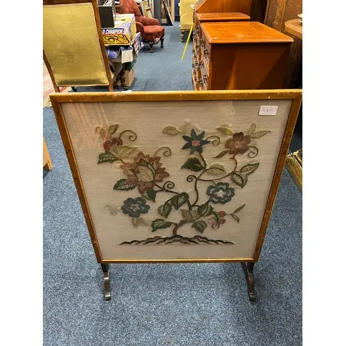 Upholstered firescreen.
