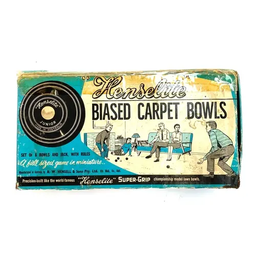 A set of vintage Henselite biased carpet boules, in original...