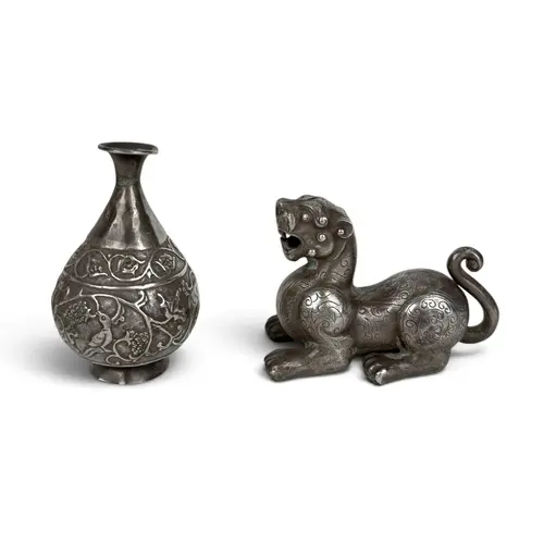 AN EARLY 20TH C ARCHAIC-STYLE CHINESE SILVER LION AND VASE...