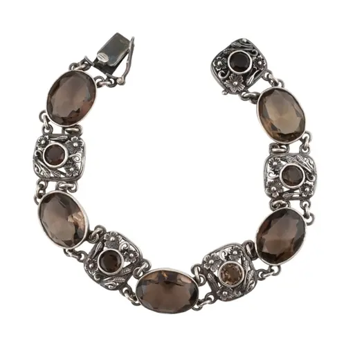 A 1970s hallmarked silver and smoky quartz Arts and Crafts s...