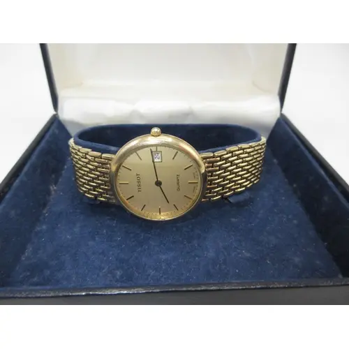 Gents 9ct Gold Tissot Quartz Watch on a 9ct Gold Bracelet, 5...
