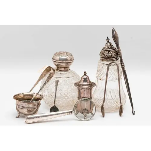 AN ASSORTMENT OF SILVER ITEMS, to include a matching pepper ...