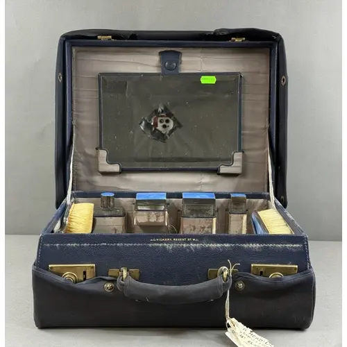 Silver: a silver and blue guilloche enamel dressing table se...