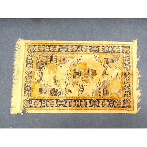 Oriental beige ground silk rug, 110cm x 68cm.
